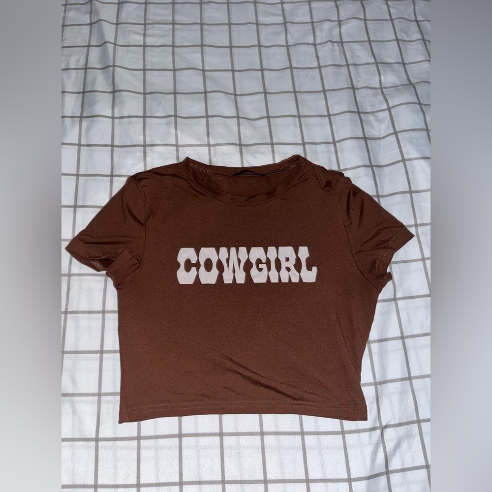 Infamous cowgirl top. Super tight fitting.
